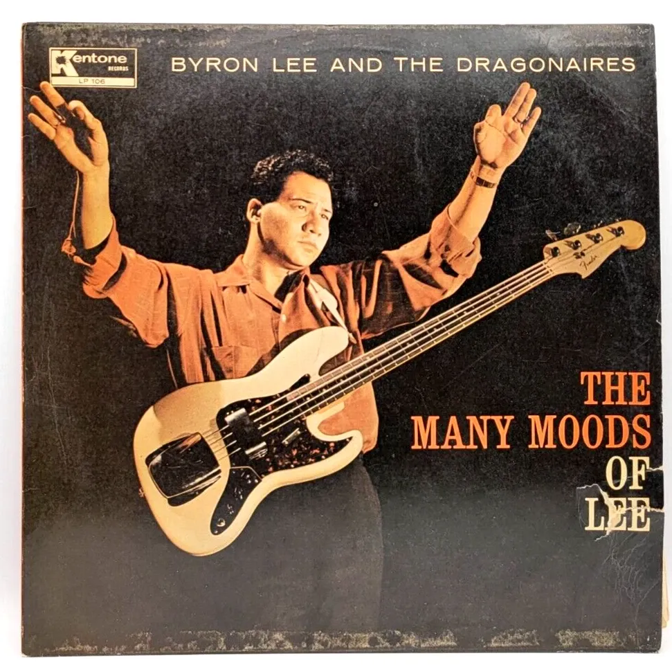 Byron Lee and the Dragonaires Record Cover with Byron holding a guitar in front of a black background